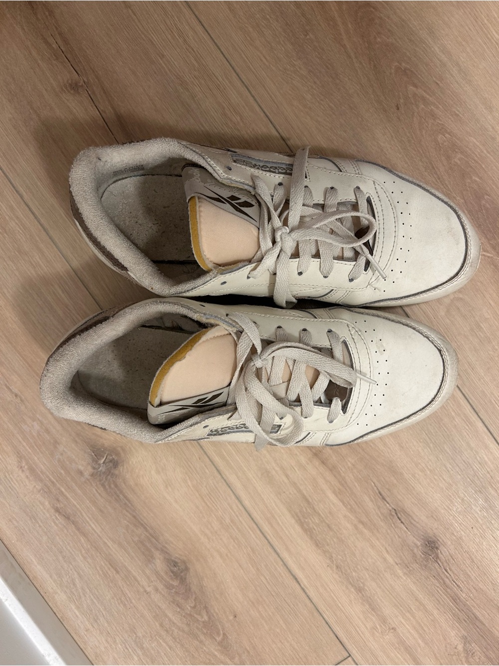 Reebok Off-White Suede Low-Top Sneakers with Yellow Tongue Accent